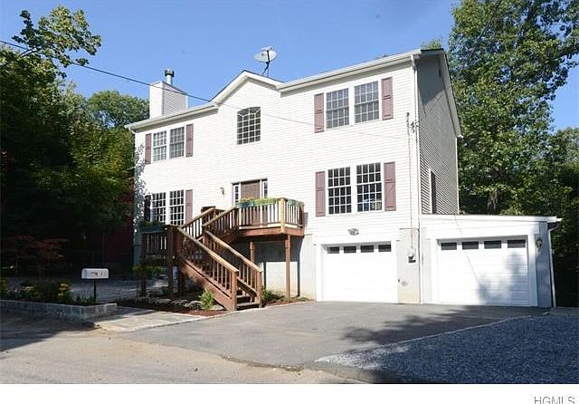 Welcoming two story colonial on quiet street.