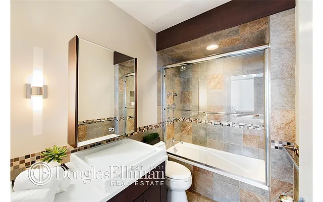 Sold by Douglas Elliman | media 13