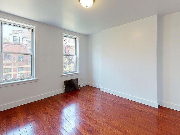 4th image of 125 E 7th St APT 3E