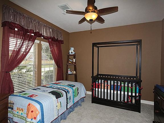 The multi-functional private Study can  be used in a variety of ways.. Craft Room, Home Office, Home Gym or 5th Bedroom! (as shown)