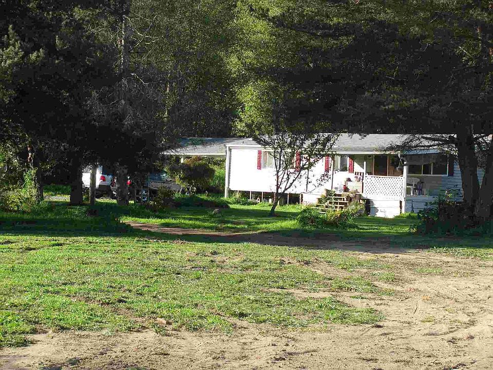 Front View of Home with Carport