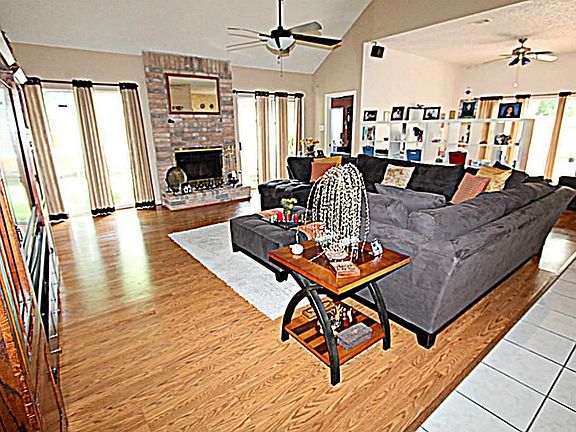 THE SPACIOUS DEN IS THE PERFECT PLACE TO SPEND TIME WITH YOUR FAMILY AND FRIENDS