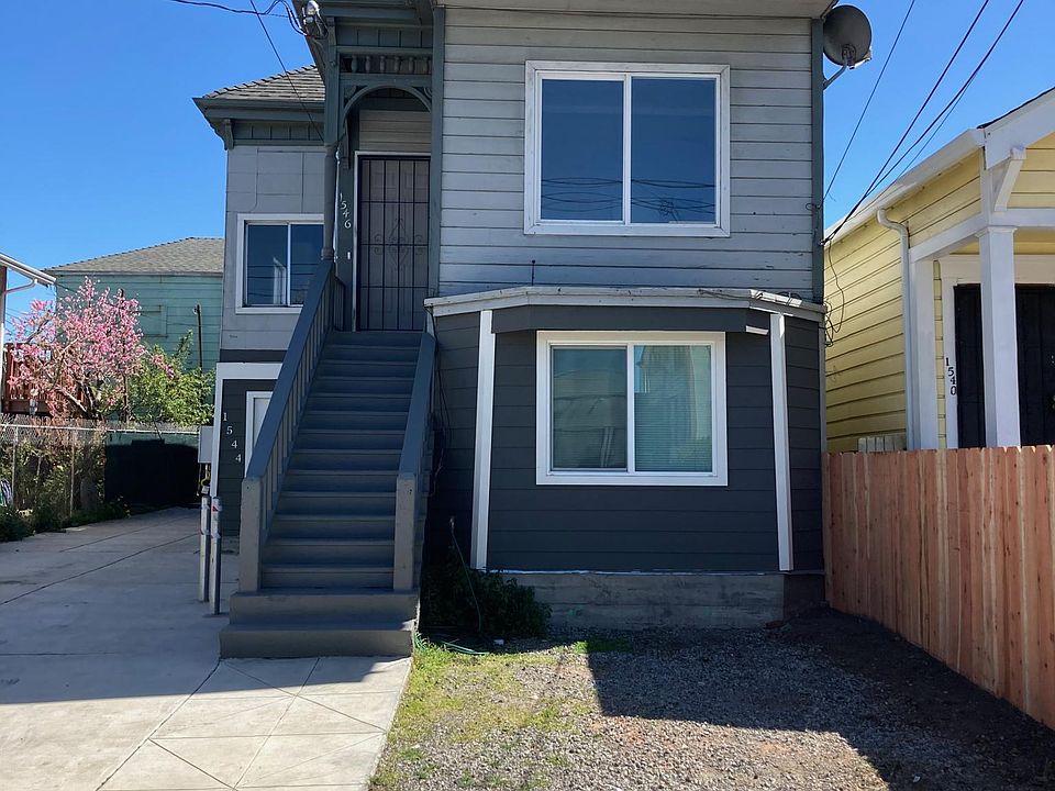 Front exterior with new fence.