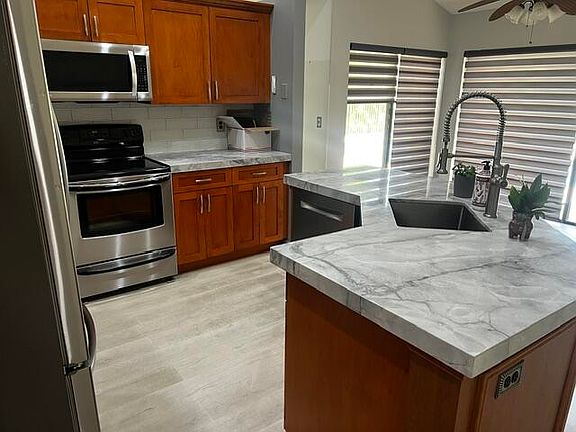 5th image of 6063 Sun Berry Cir