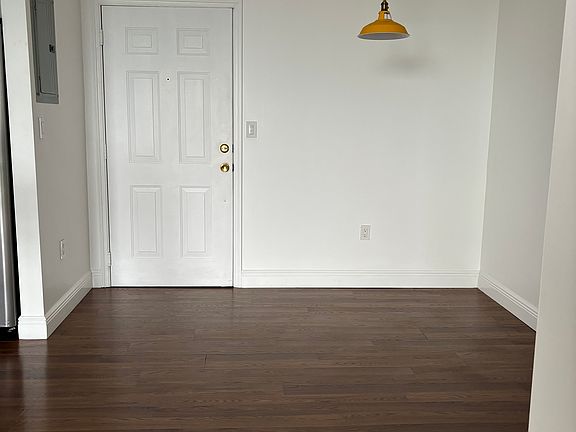 Entrance with room for a small table on the side.