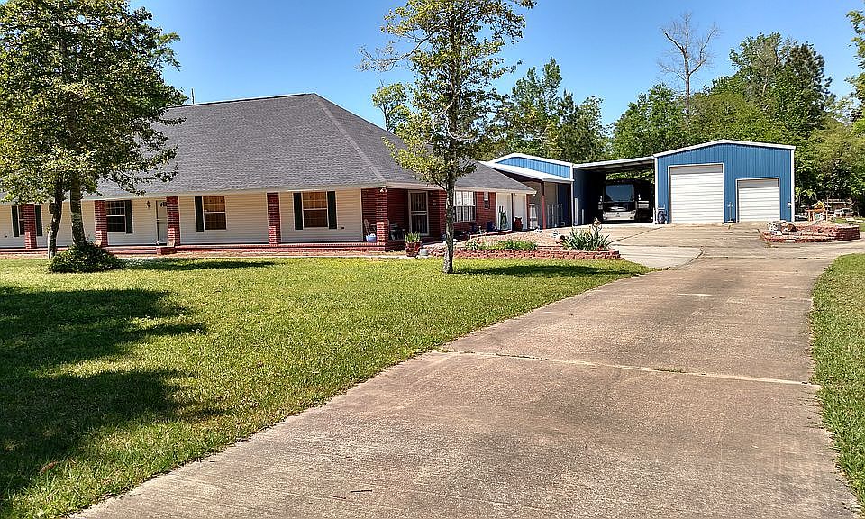 House with metal buildings 
