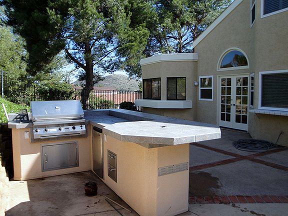 Backyard boasts built in BBQ