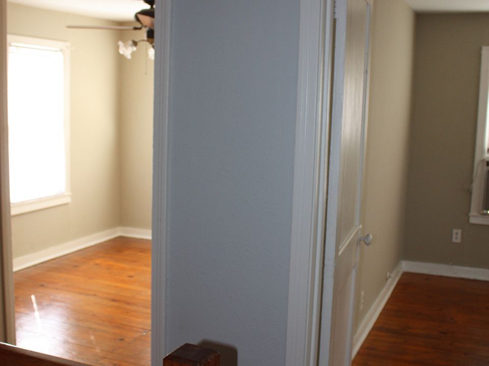2 bedrooms with wood floors