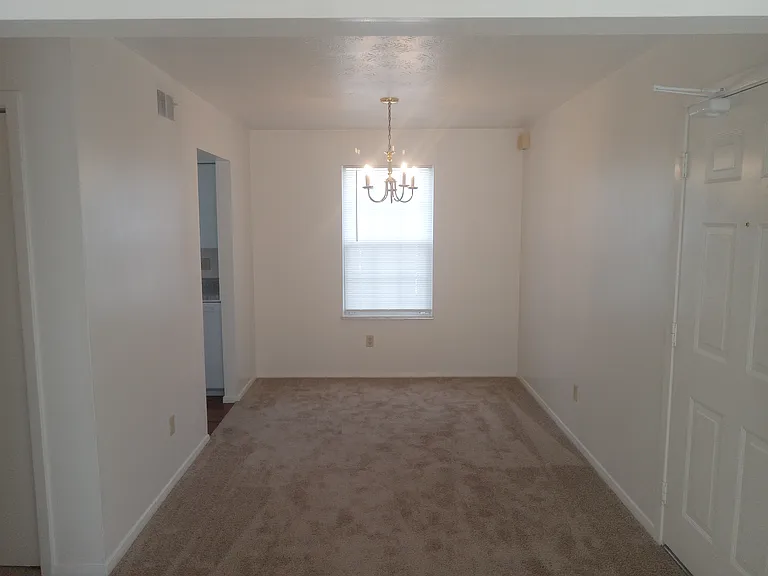Dining area next to kitchen. Dining area adjoins Living Room