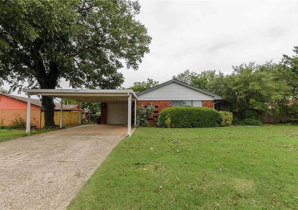 This 3 bed 1 bath home has nice large trees, and a garage with an additional full bath, as well as a carport.