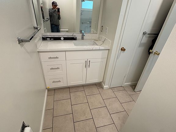 Bath fresh paint, new recessed lighting, new fan, new counter top quartz, new sink, new sink faucet.