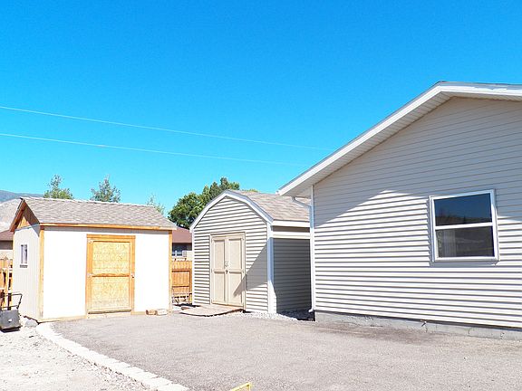 Outbuildings & more parking