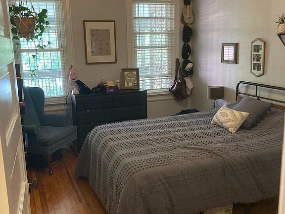 Huge master bedroom with original hardwood floors!