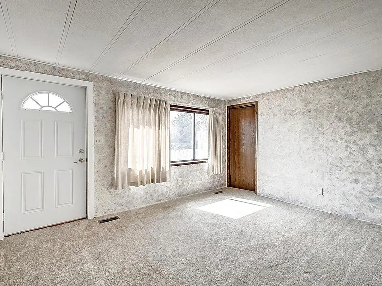 Living room with cable TV connection if desired.