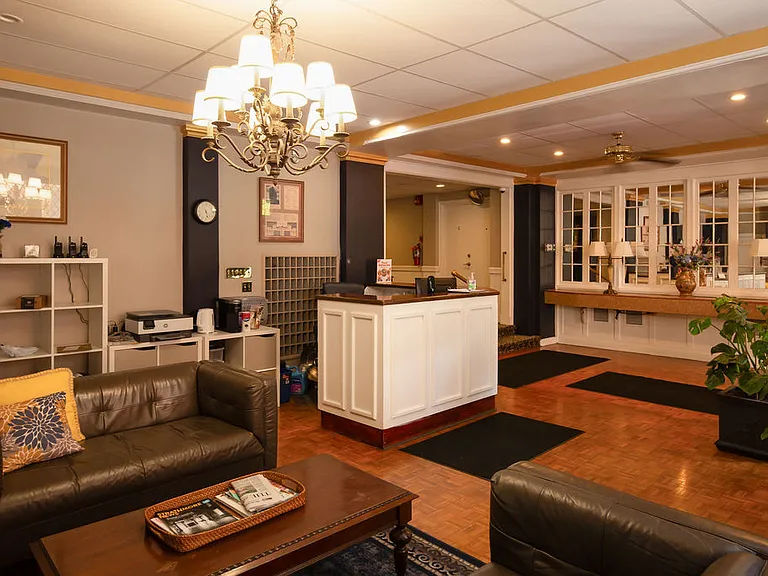 Front desk and lobby with 24-hr concierge and security