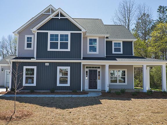 Elevation F with 3-Car Sideload Garage Option