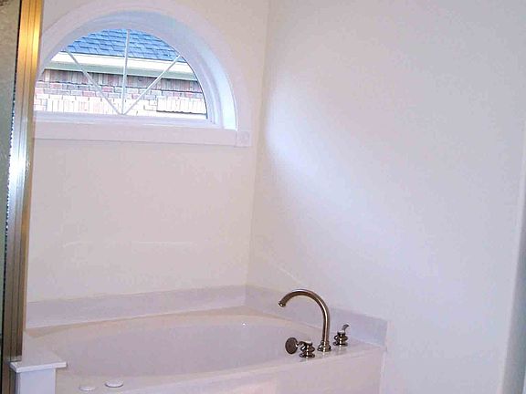 Master Bath with whirlpool tub.