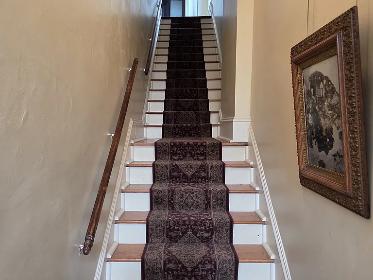 Common Hall/stairs, up to REAR apt from West Broad St Hall/stairs common locked entry door.