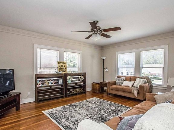 Spacious living room with lots of natural light.