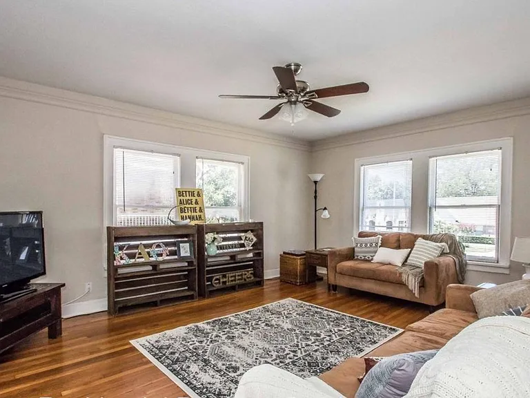 Spacious living room with lots of natural light.