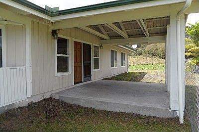  Covered front porch has 224 square feet and is located on the right side 