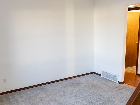 This room on the front of the home (and on the main level) can be used as a formal dining room, office or flex room.