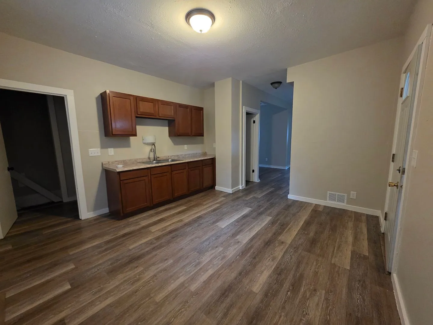 Spacious 5BR Home with Eat-In Kitchen | Upper Loft Area | Partially Fenced in Yard | 2,200 SQF — Photo 2