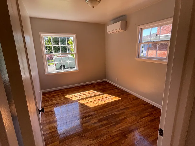 Master bed. Faux Wood Blinds installed since photo was taken.