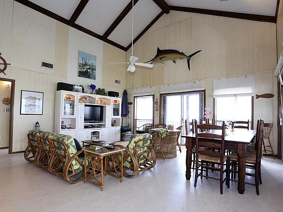 Open great room is spacious and ready for entertaining and the spectabular bay views.
