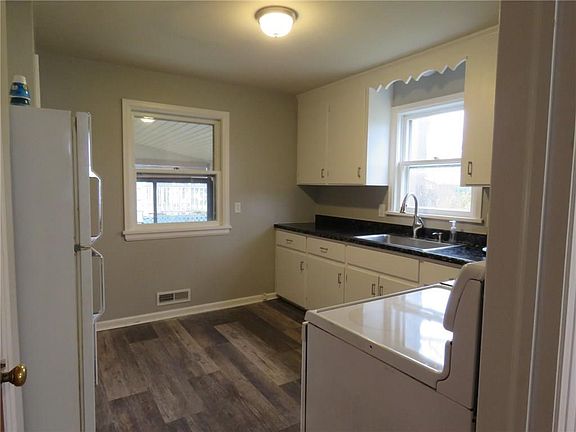 Updated kitchen with new floor and appliances included