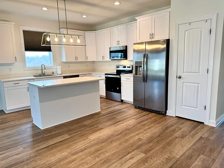 169 Coastal Drive - Kitchen with Quartz Countertops & Shaker Cabinets