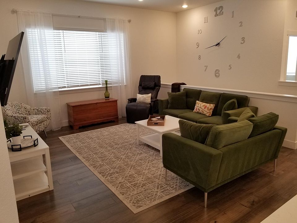 New sofas, massage chair, 65" TV.
