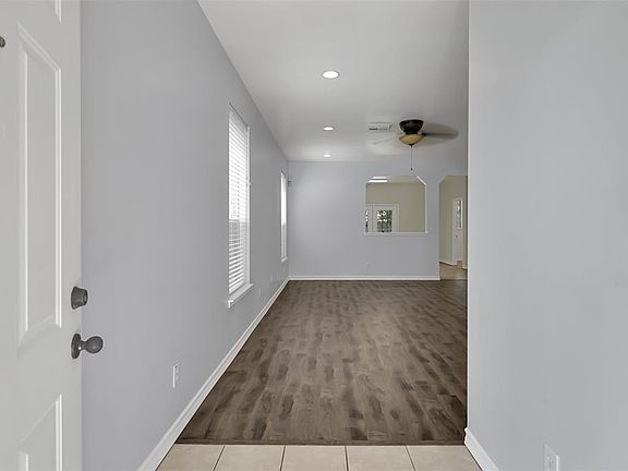 As you enter your new home, you will enter your foyer and spacious living room.