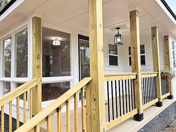 Porch and front windows of living room