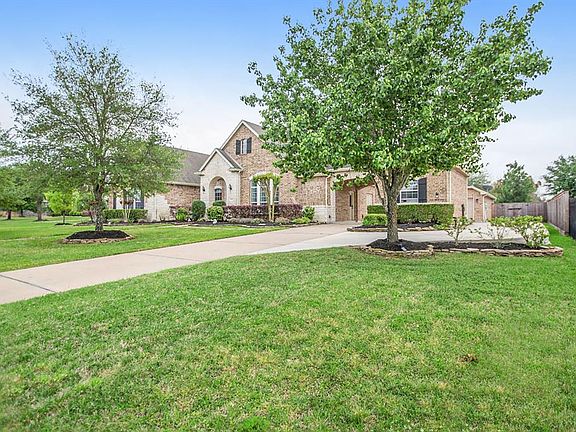 This home boasts a timeless exterior and plenty of elbow room from neighbors!