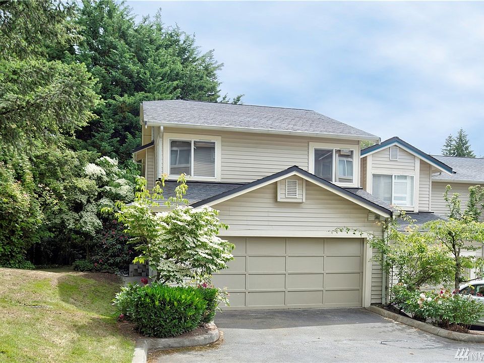 End unit Townhome with private side yard and two car garage!