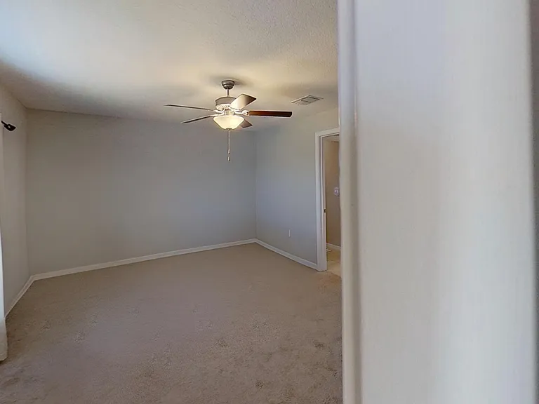 Spacious master bathroom with a walk-in closet,
