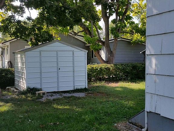 Convenient outdoor storage with a spacious yard.