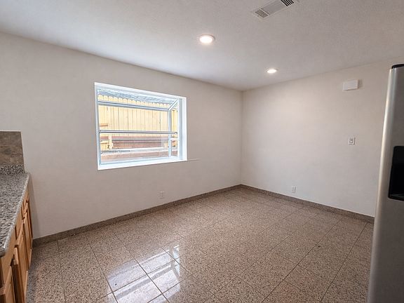 Spacious dinning area right next to the kitchen.