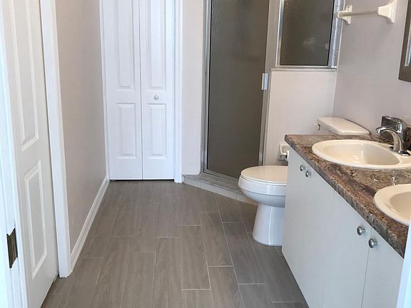 Master Bathroom with double sinks, Linen Closet and Huge Wal