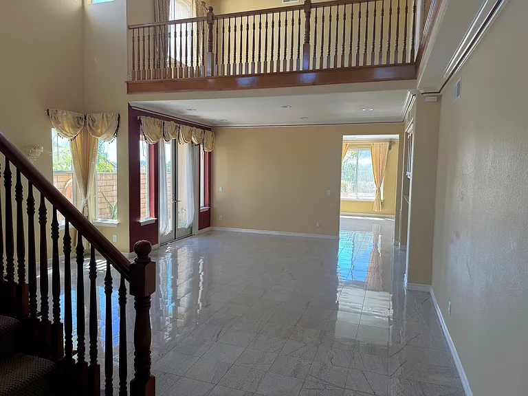 Stairs leading to upstairs and view of the upstairs loft Office/Workspace