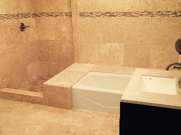 Master tub and glassed in showers