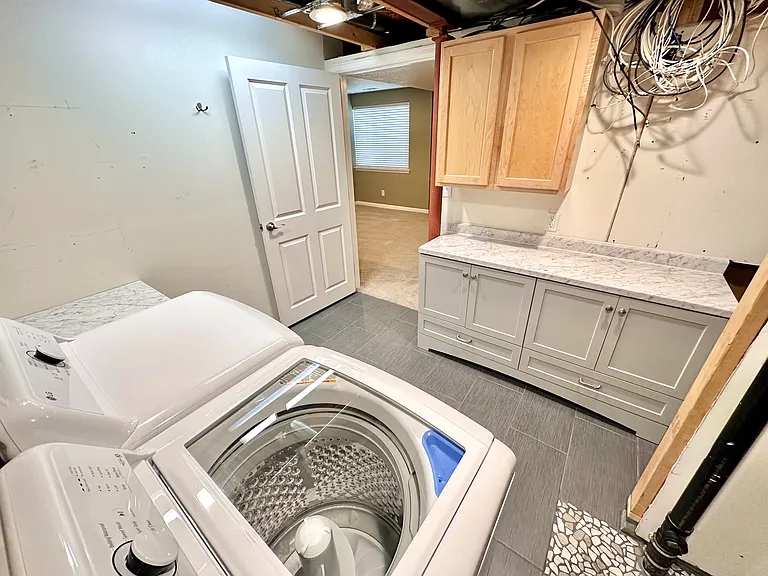 Basement laundry room.