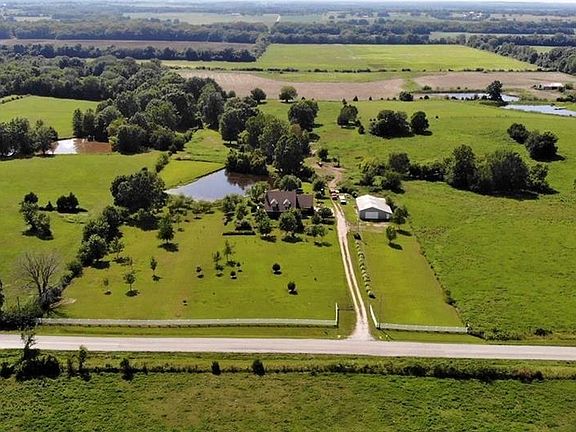 Notice that County Road T is paved....no gravel from Kingsville or Holden...   This is a very quiet and peaceful location.