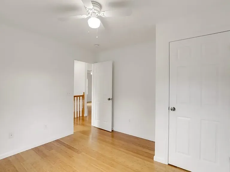 3rd bedroom with deck & garden view