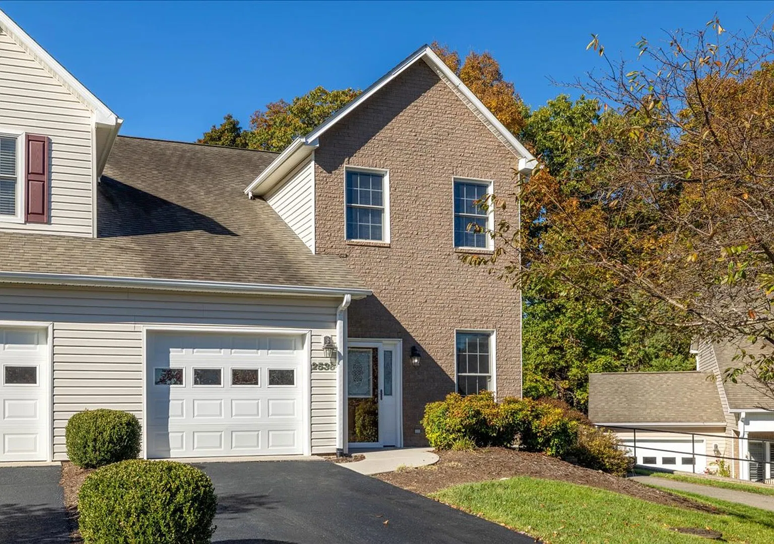 End-Unit Townhome with Open Backyard in The Orchards — Photo 1