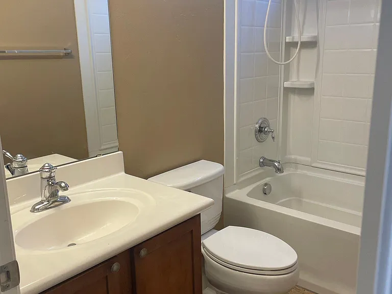 Guest bathroom with tub and shower and great light from window