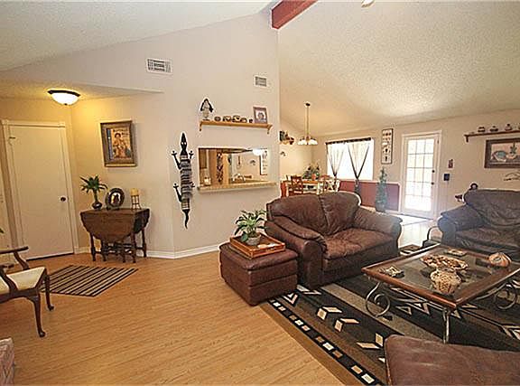 Step through the door into this enormous family room