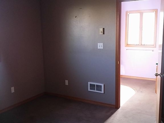 Master bedroom looking into master bathroom