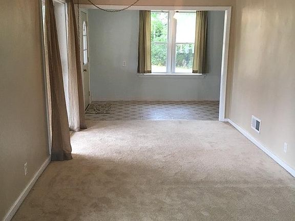Looking at Dining Room and side entry from Front Door